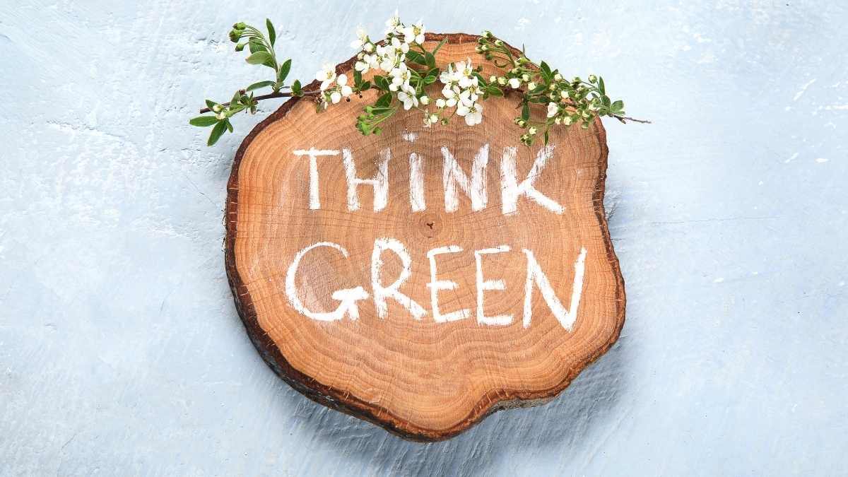 tree cutting with think green written on it