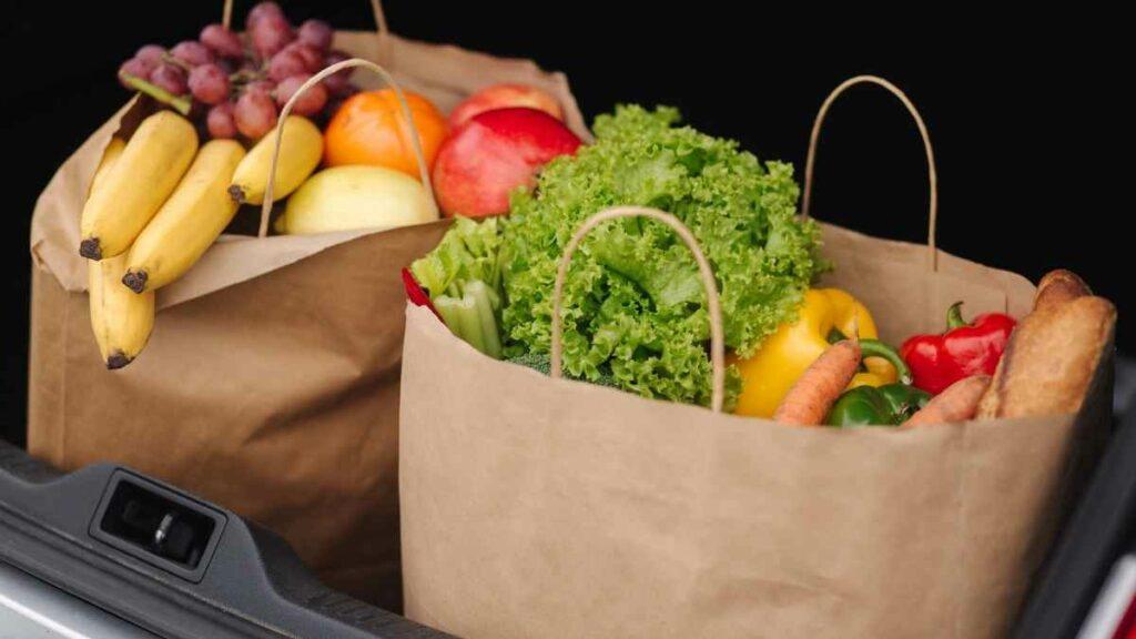 paper bags with groceries in